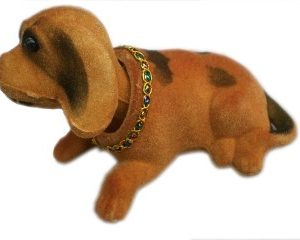 Детско кученце с клатеща глава