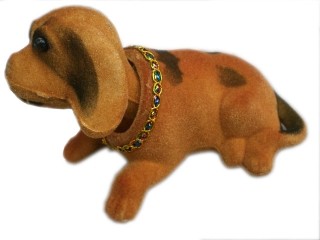 Детско кученце с клатеща глава